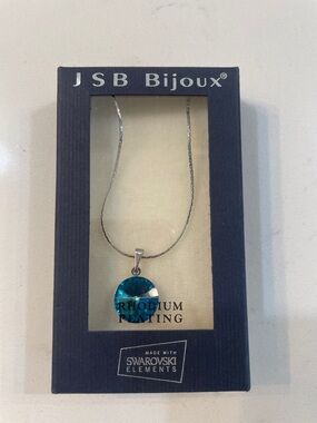 Rhodium-Plated Necklace with Teal Crystal Pendant